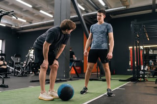Trainer encouraging athlete
