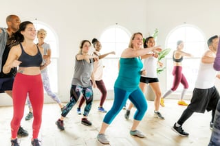 People dancing in fitness class